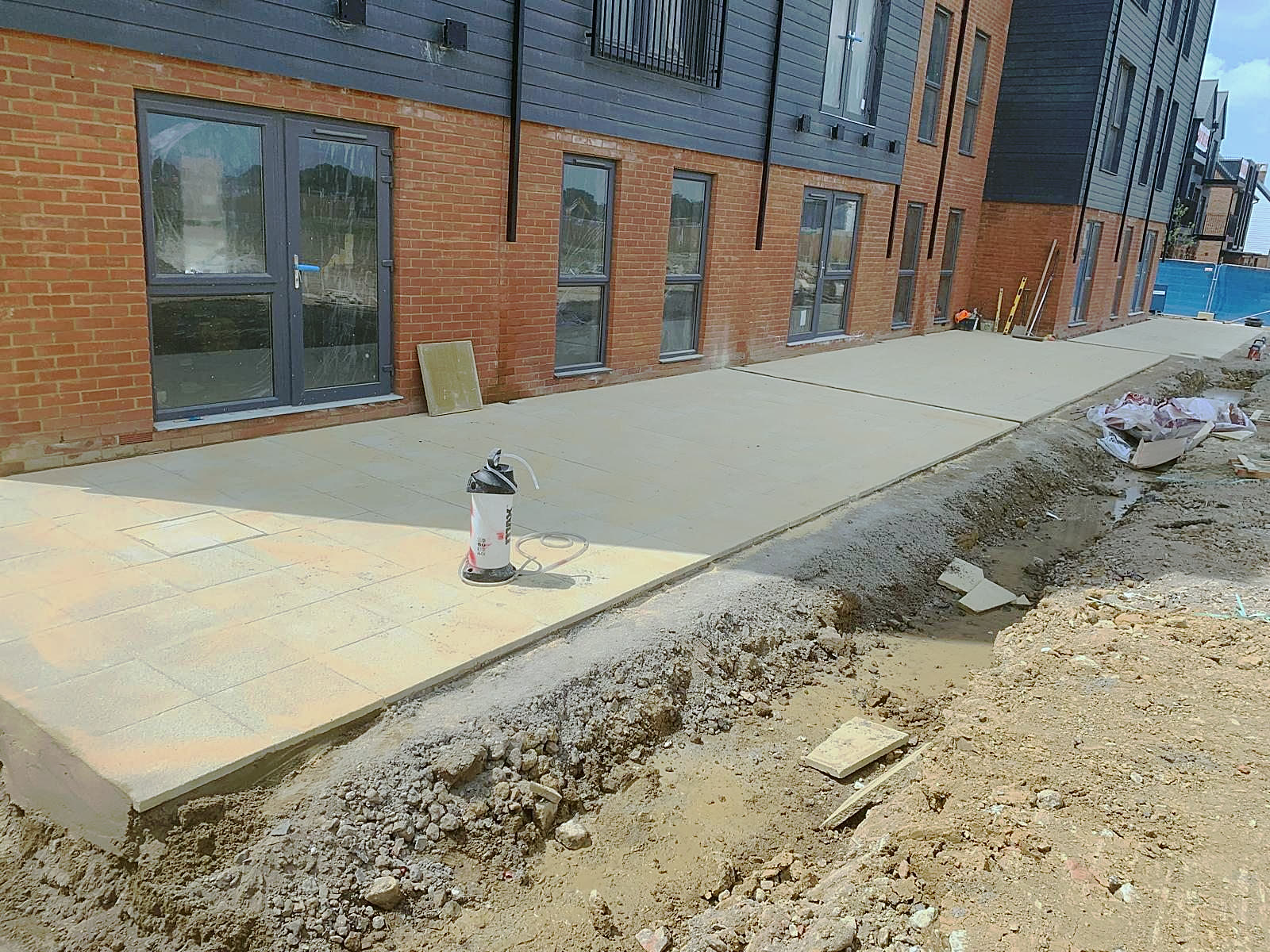 Slab path along a new building