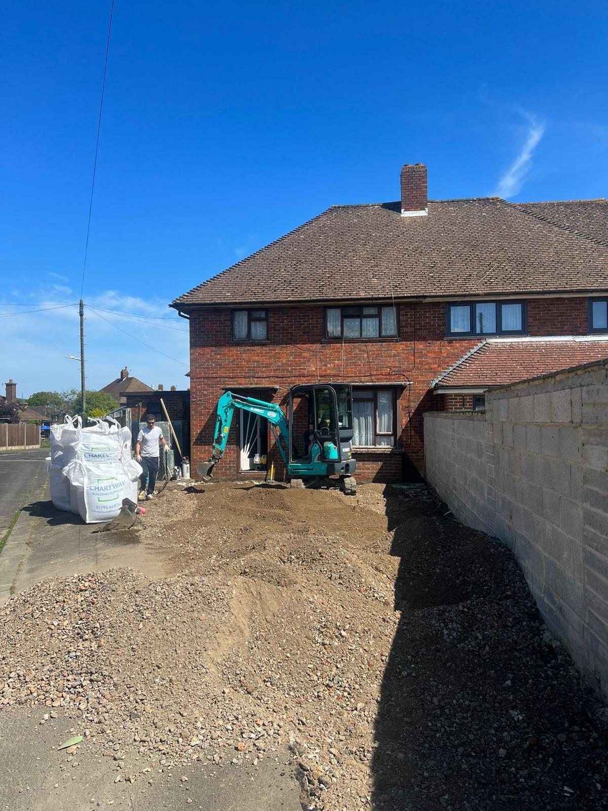 Excavating the old ground for a new driveway