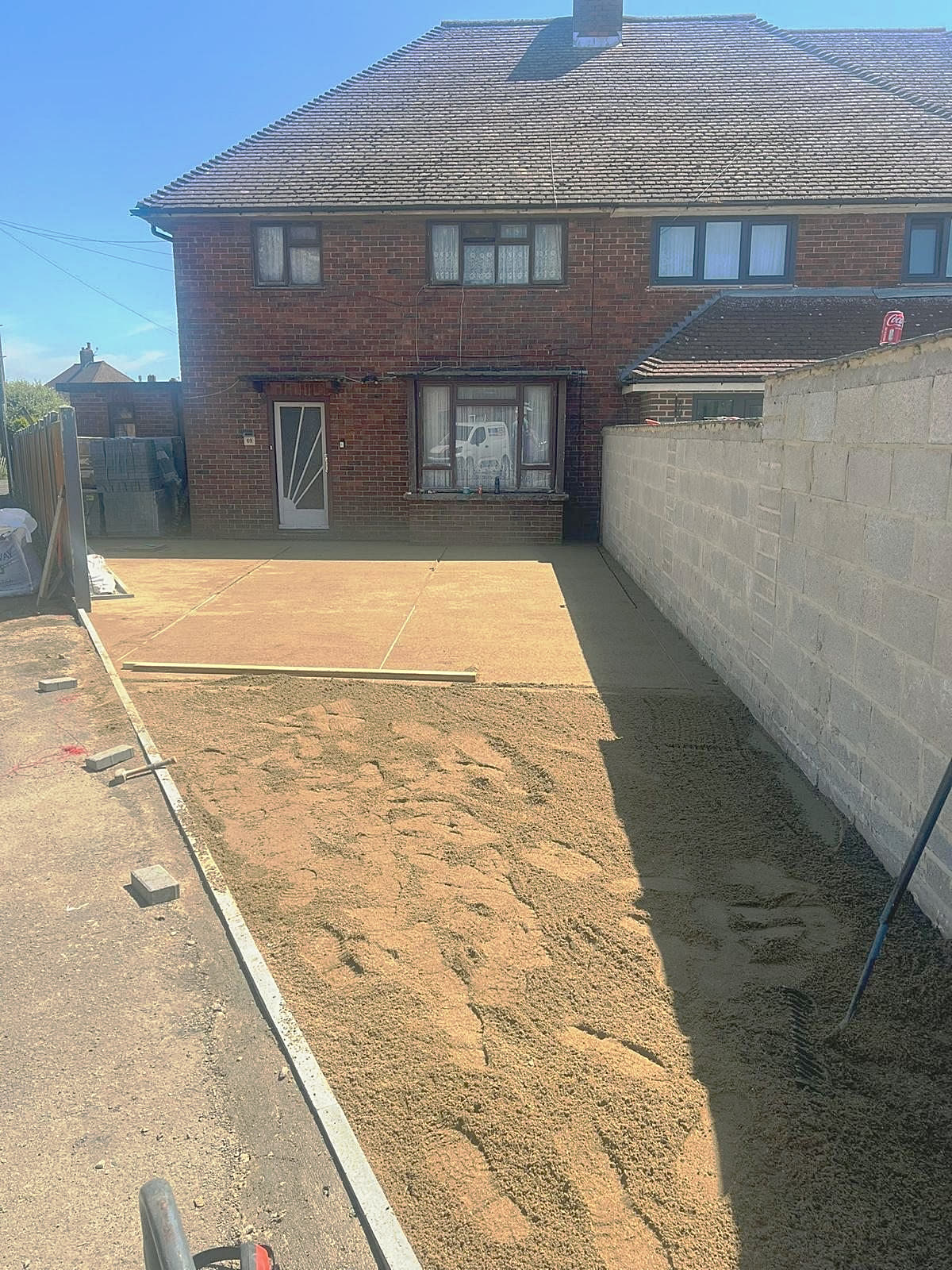 Screeded sand bed ready for the blocks